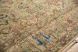 Distressed Tabriz carpet's worn texture, showing foundation and blue, terracotta floral patterns.