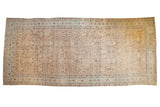 Antique distressed Persian Malayer carpet, allover Herati design with muted ivory, sand, and pale blues.