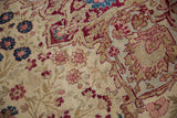 Late 19th century Kermanshah rug's mil fleur motif, with cochineal red, blush, sky blue.