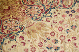 Storied pile and mil fleur design on antique Kermanshah carpet in ivory, cochineal, blue.