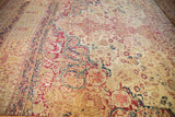 Antique Persian Kermanshah carpet with mil fleur field and cochineal red border, mostly even wear to knot heads.