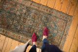 Detail of distressed vintage Hamadan rug, highlighting Herati motif and starbursts in dusty teal, bronze, blush, and wear.