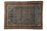 Distressed Persian Malayer rug with an allover Herati pattern and striking blue corner spandrels.