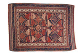 Antique Persian Afshar rug, early 20th century, allover geometric design in navy, red, and ivory.