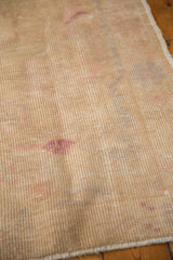 Oushak rug pile with even wear, exposed foundation, and intact side selvage.