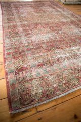 Vintage Meshed rug with cochineal red, sky blue milfleur pattern, visible foundation.