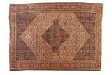 Antique Senneh rug, hand-knotted, diamond medallion, Herati motif, ivory, madder red, navy blue.