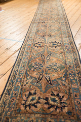 Antique Yazd runner showcasing Safavid-inspired palmettes in aged ivory, navy, and sky blue pile.