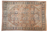 Distressed vintage Mahal carpet with allover palmette design in terracotta, ivory, navy.