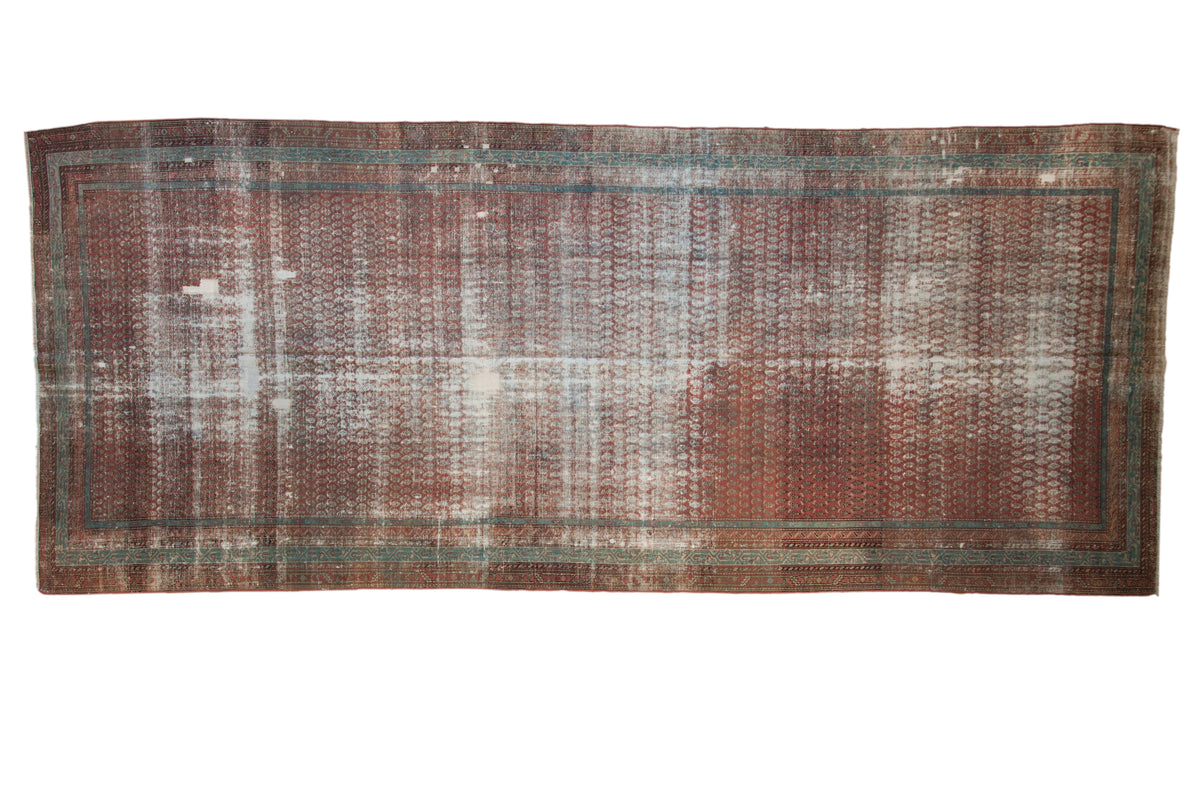 Antique distressed Malayer runner with an allover mir boteh pattern in terracotta and faded sky blue.