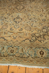 Faint foundation showing on distressed Kashan rug, intricate dusty blue floral border.