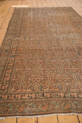 Vintage distressed Malayer runner with allover boteh pattern and worn terracotta hues.