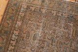 Distressed Malayer rug runner's allover interconnected panel design with boteh motifs and wear.