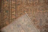 Hand-knotted foundation of the Malayer runner, with distressed rust and blue pile.