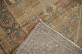 Distressed Serab runner corner reveals textured pile with powder blue and madder red plant motifs, and hand-knotted reverse.