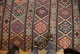 Antique Shirvan Kilim rug with geometric bands in navy, brick red, ivory, and fire design borders.