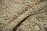 Worn Herati pattern on distressed vintage Shiraz carpet, with faint foundation showing.