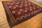 Vintage Ersari carpet border with intricate ivory hook and latch motifs.