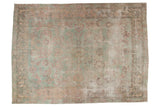 Distressed vintage Persian Yazd carpet, faded allover floral design in seafoam green and blush.