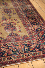 Vintage Persian Sarouk carpet corner, border cartouche, germinating paisley, worn gold, red, navy.