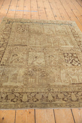 Gardens of Paradise panels and cypress tree border of vintage Tabriz rug.