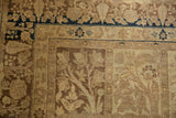 Vintage Tabriz rug: Gardens of Paradise tree panel and cypress border. Mostly even wear, brown and beige tones.