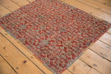 Vintage Mahal rug's allover Herati motif in cherry red, dusty blue, and polychrome selvage.