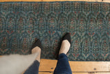 Distressed vintage Malayer runner, allover boteh design, deep ocean blue, powder blue, cherry red, and even wear.
