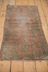 Distressed floral patterns with vine border, showing faint foundation in dusty rose and aqua.