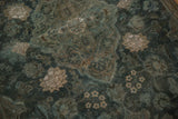 Distressed Kashan rug pile with aqua teal and antique ivory floral motifs.