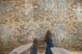 Distressed Kerman runner with Rococo-inspired sky blue and rose floral motifs.