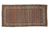 Antique Haji Jalili Tabriz runner, allover terra cotta field with navy germinating boteh, 2'7