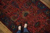 Vintage hand-knotted Bijar runner, raspberry red field with indigo blue oversized palmettes.