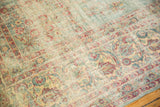 Distressed Kerman carpet section with faded powder blue and cochineal vinery border.