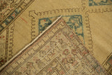 Folded corner of the Serab runner, showing distressed geometric pile and hand-knotted back.