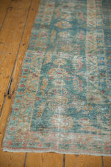 Distressed Mahal runner with visible wear, featuring faded ocean blue-green leaves and palmettes.