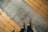 Distressed vintage Meshed runner, ocean green palmettes, blush motifs, with mostly even pile wear.