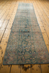 Distressed vintage Meshed runner texture with ocean green, blush, and wine red motifs.