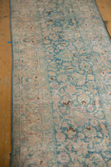 Traditional distressed Meshed runner detail: ocean green palmettes, blush tones, exposed foundation.