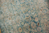 Distressed Vintage Meshed rug runner with faded scrolling vines, ocean green, blush, and visible foundation.