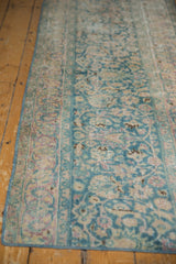 Worn vintage Persian Meshed runner detail, faded ocean green palmettes, blush, showing knot heads.