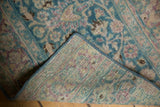 Distressed Meshed runner detail, showing ocean green, blush pattern and woven foundation.