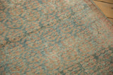 Distressed Malayer runner field featuring faded raspberry botehs on ocean green with even wear.