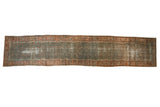 Distressed vintage Malayer runner featuring faded deep ocean green Herati pattern and dusty blush floral border.
