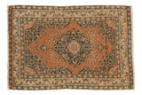 Antique Tabriz rug mat, scalloped roundel medallion with floral design in terra cotta, navy, and ivory.
