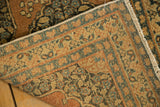 Antique Tabriz rug backside, showing its secure woven foundation and border patterns in rust and blue.
