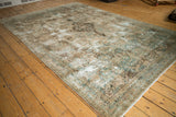 Vintage Distressed Kerman rug showcasing faded European floral patterns and prominent wear to foundation.