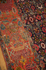 Antique Bijar rug fragment seam joining worn brick red and navy Herati pattern sections.