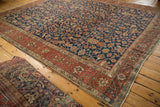 Finer Heriz weave, intricate navy allover design, madder red border.