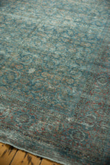 Distressed vintage Tabriz carpet with faded sapphire and wine Herati pattern, showing wear to foundation.